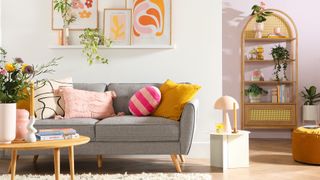 grey sofa with colourful cushions and coffee table with decorative objects