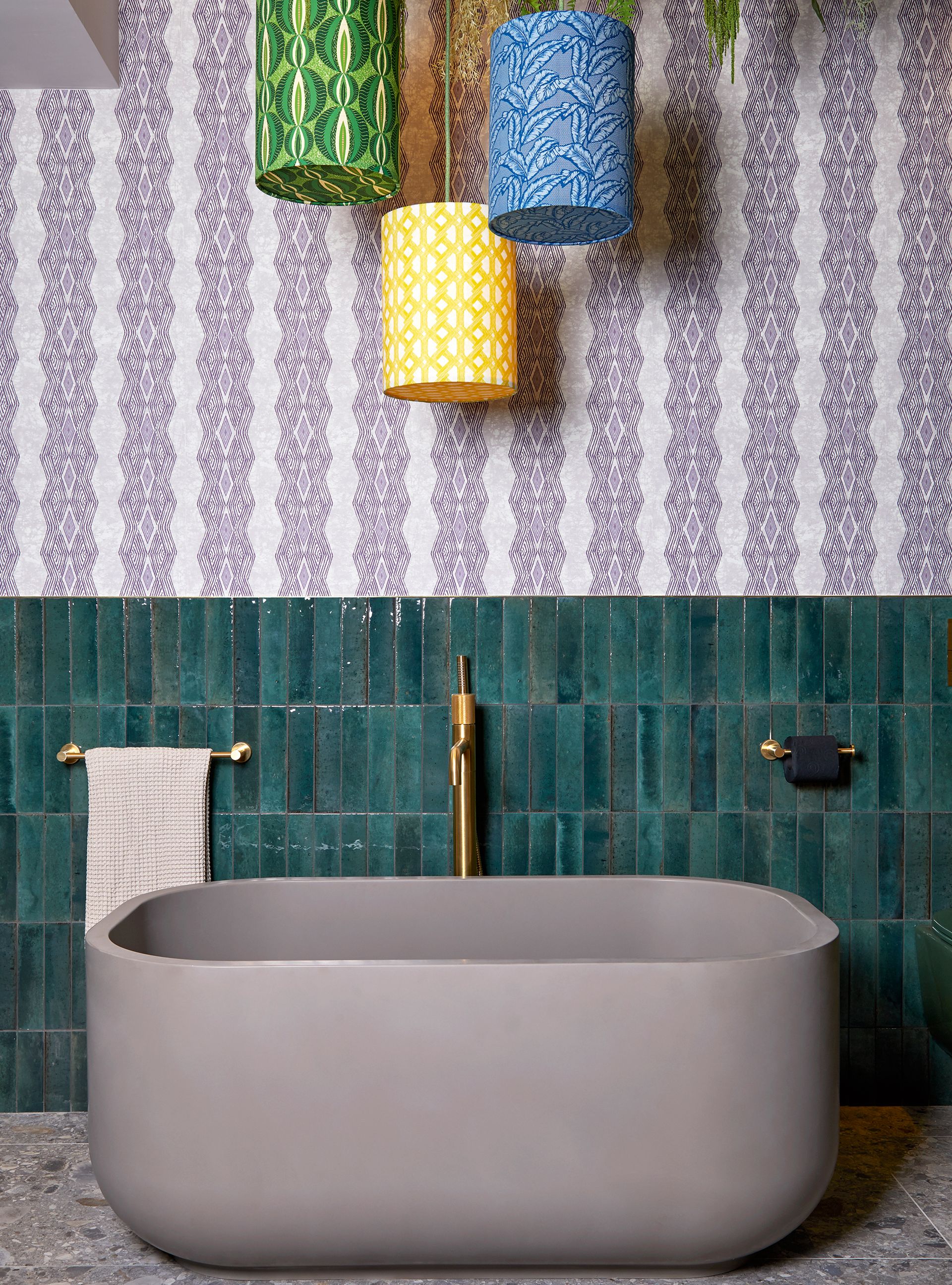 Bathroom color scheme with purple wallpaper and green tiles