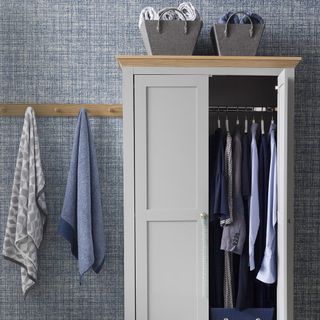 room blue textured wall cloths on cupboard