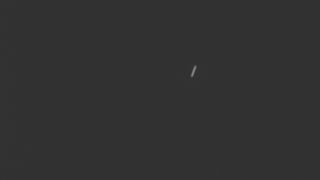 a streak of light on a black background