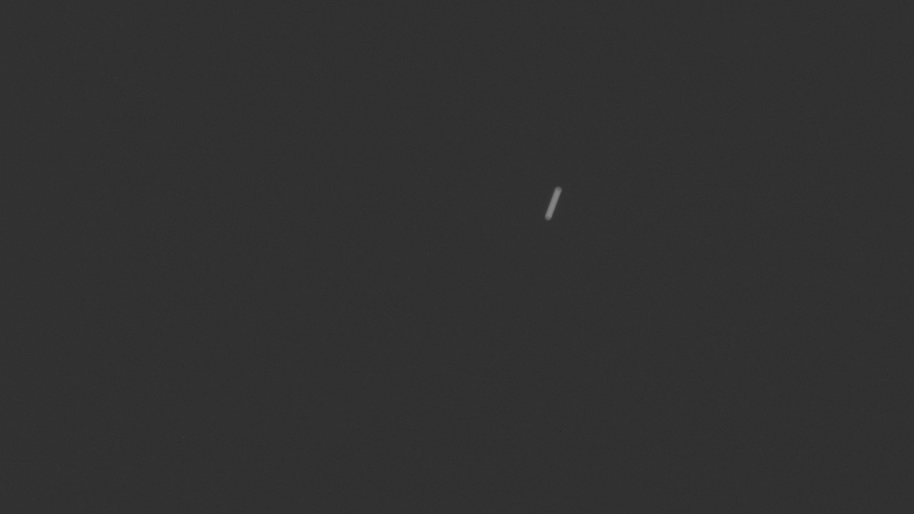 a streak of light on a black background