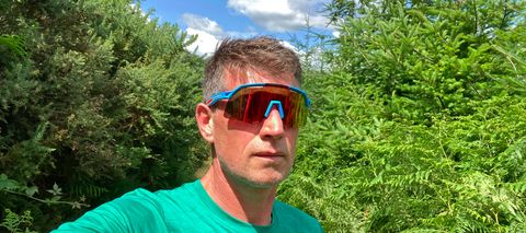 Man wearing Dynafit Ultra Evo Sunglasses – main review image size