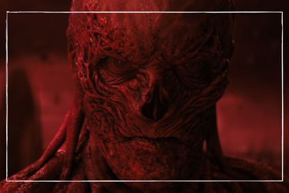a close up of Stranger Things monster Vecna against a red background