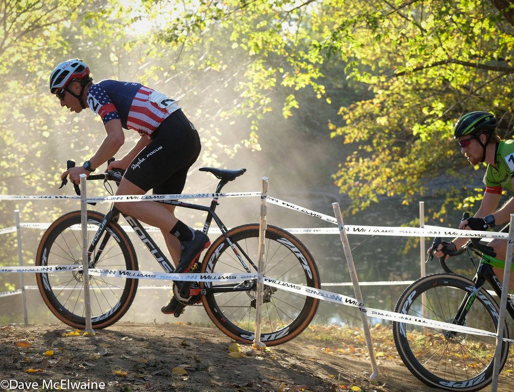 Jeremy Powers (Aspire Racing) riding through the woods in second place