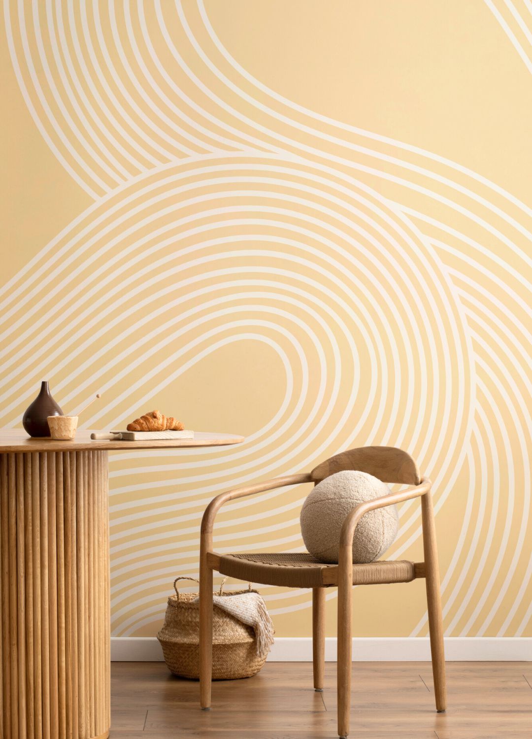 picture of chair and table with patterned yellow wallpaper