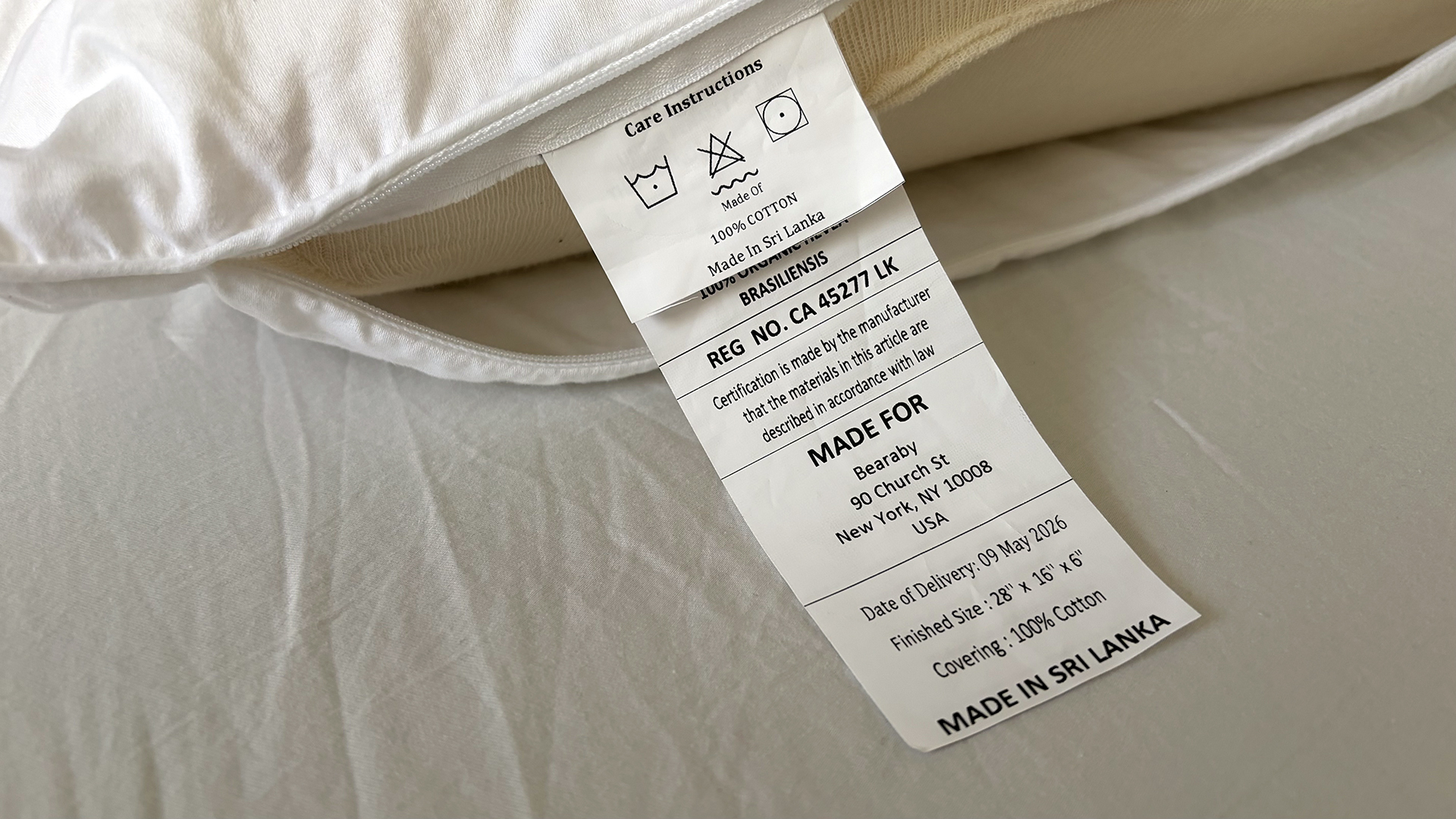 A close up of the care tag on the Bearaby SoftForm pillow