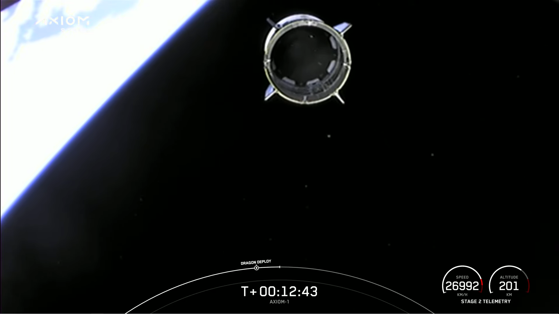 The second stage of the Falcon 9 rocket drifts away from the Dragon capsule.