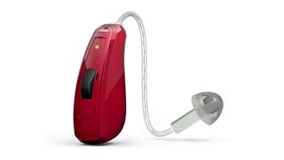 The ReSound LiNX Quattro Rechargeable RIE 61 in bright color called Monza Red