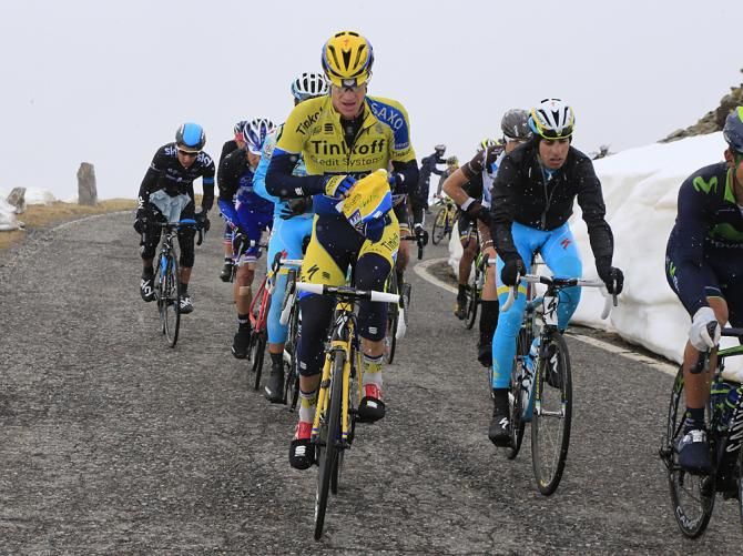 Michael Rogers gets his jacket on for the descent