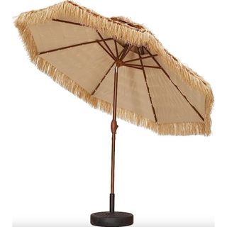Tilted umbrella with fringe