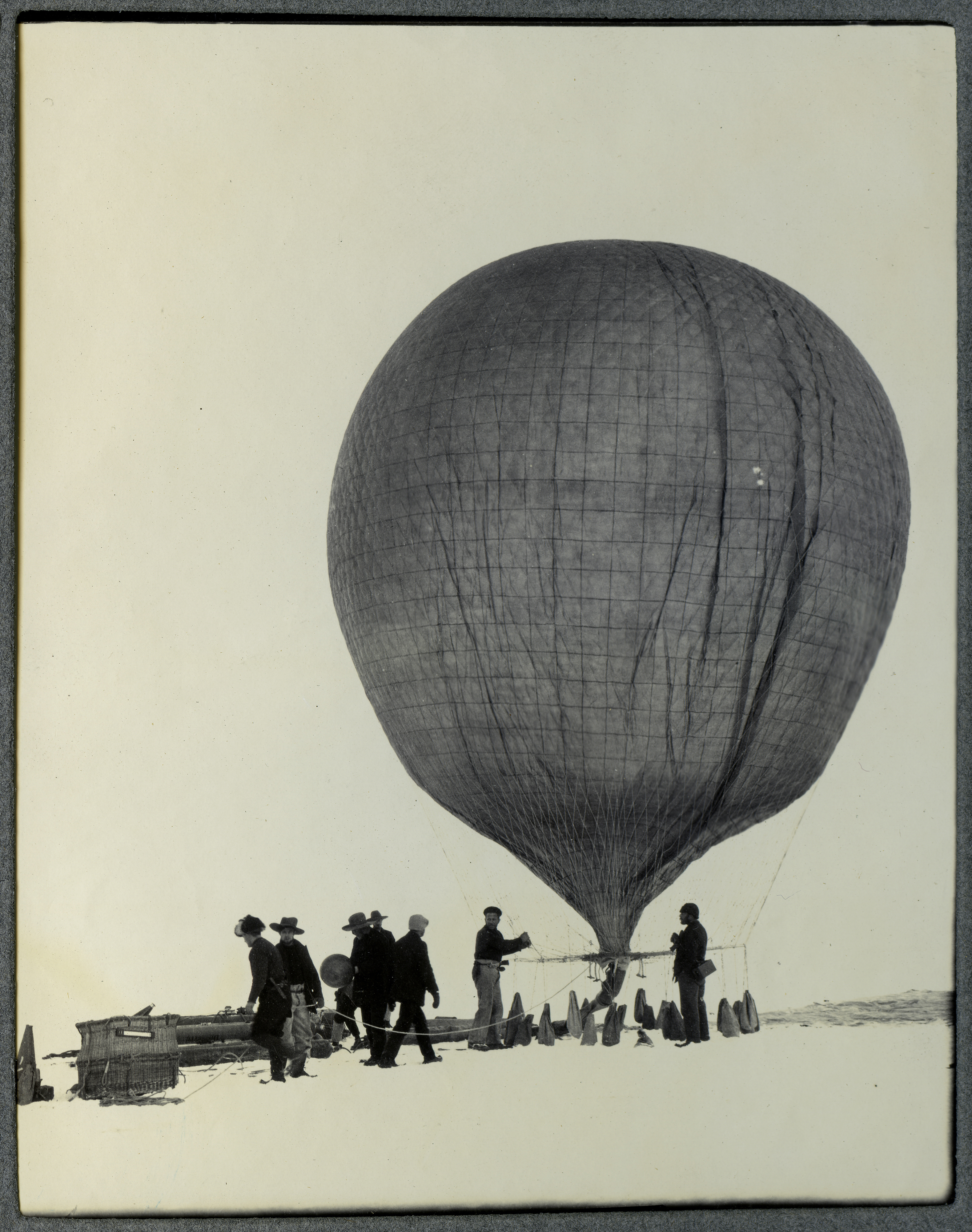 Inflating the balloon on the Barrier, Antarctica, National Antarctic Expedition 1901-1904. (Photo by Royal Geographical Society via Getty Images)