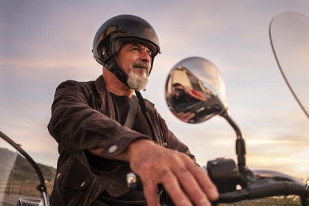 Older man on a motorcycle