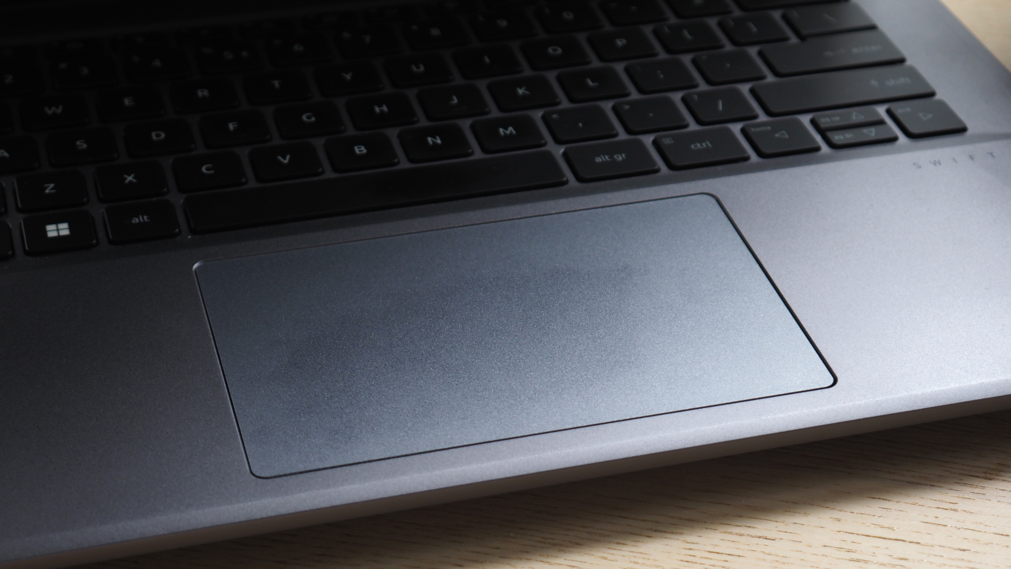 A close up of an Acer Swift X 14 mousepad