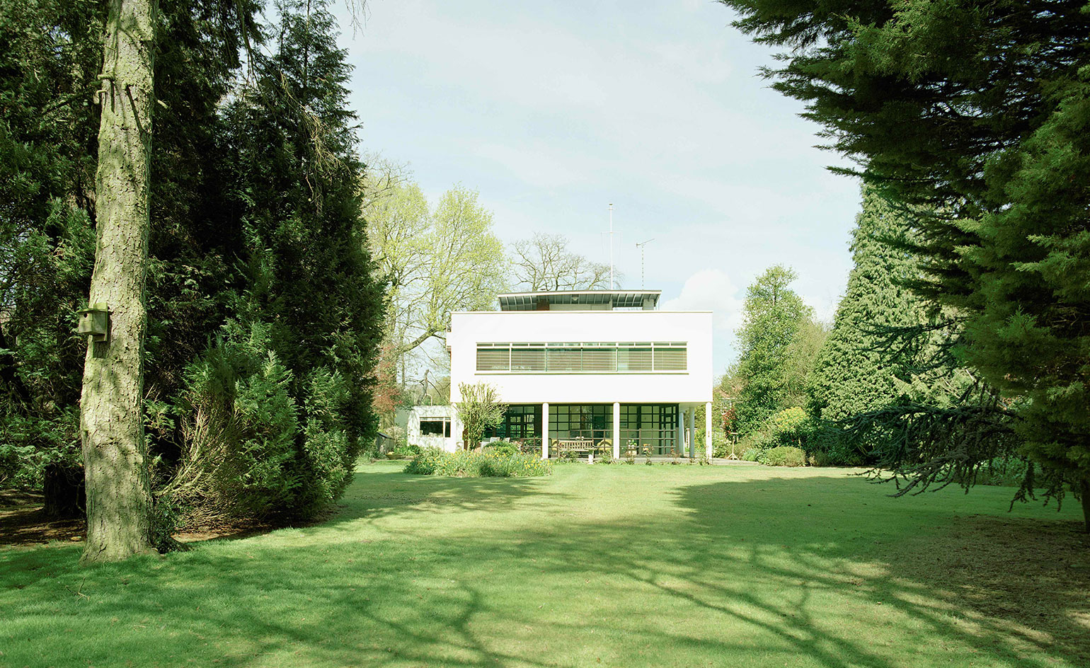 Large gardens with white home