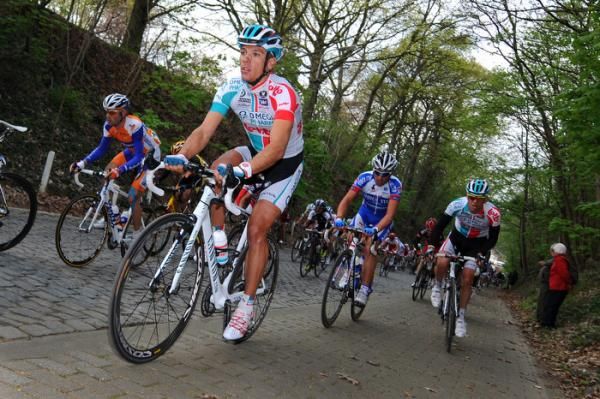Philippe Gilbert takes the smoother part of the cobbled road.