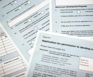 paper copies of blank planning permission application documents