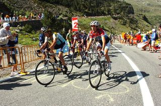 Luxembourg's Andy Schleck (Saxo Bank) looks to see the distance to Alberto Contador (Astana)