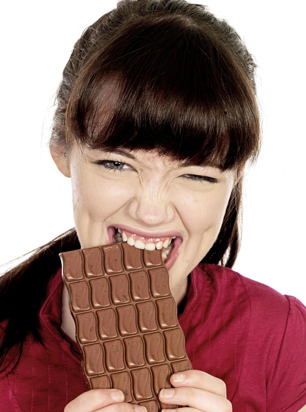 Woman eating chocolate