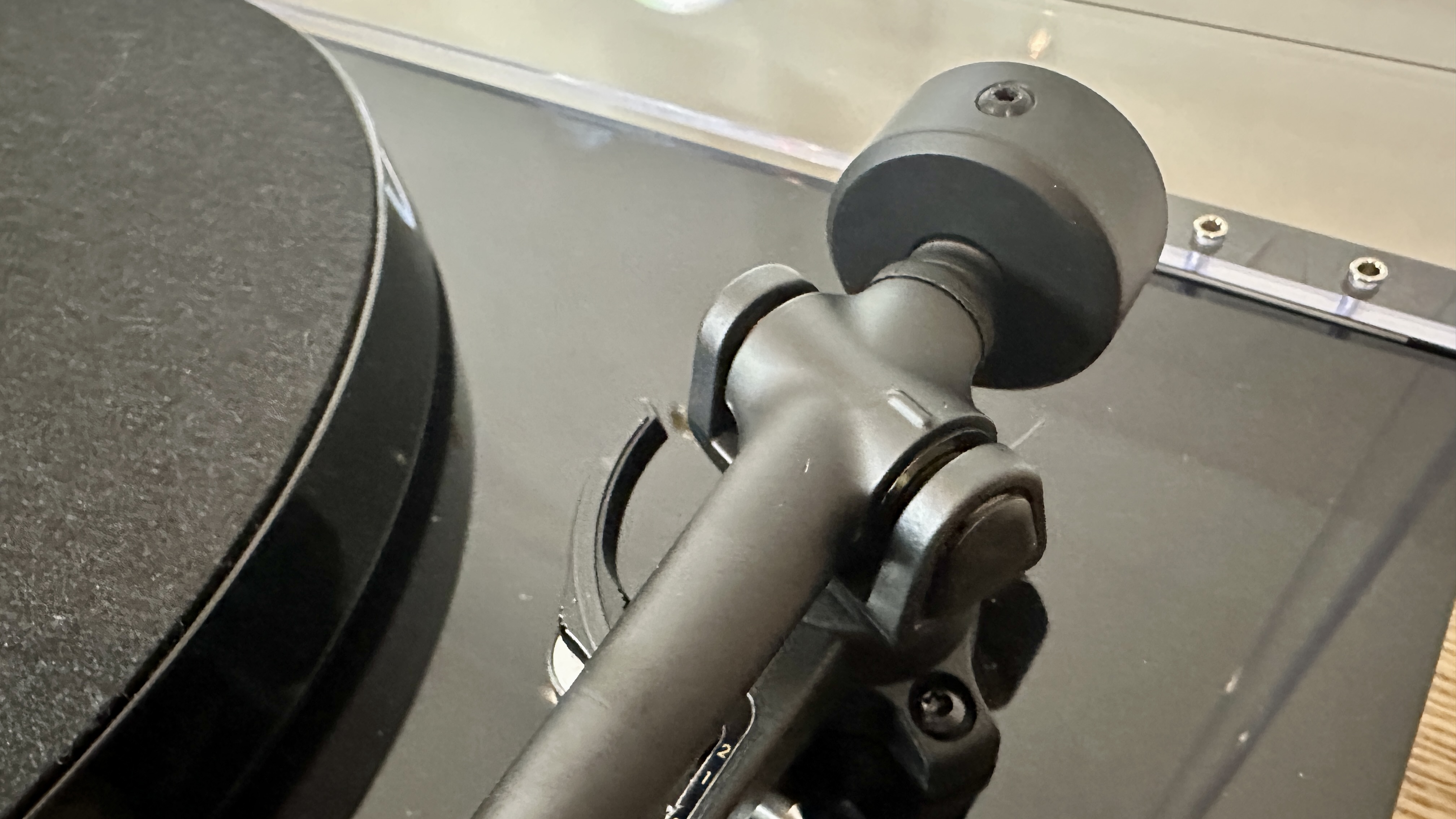 Closeup of the tonearm of the Goldring GR3 turntable.