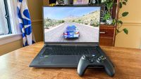 ASUS ROG Strix G18 gaming laptop with an Xbox controller