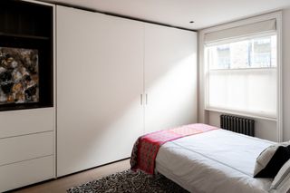 Guest bedroom with built in wardrobe