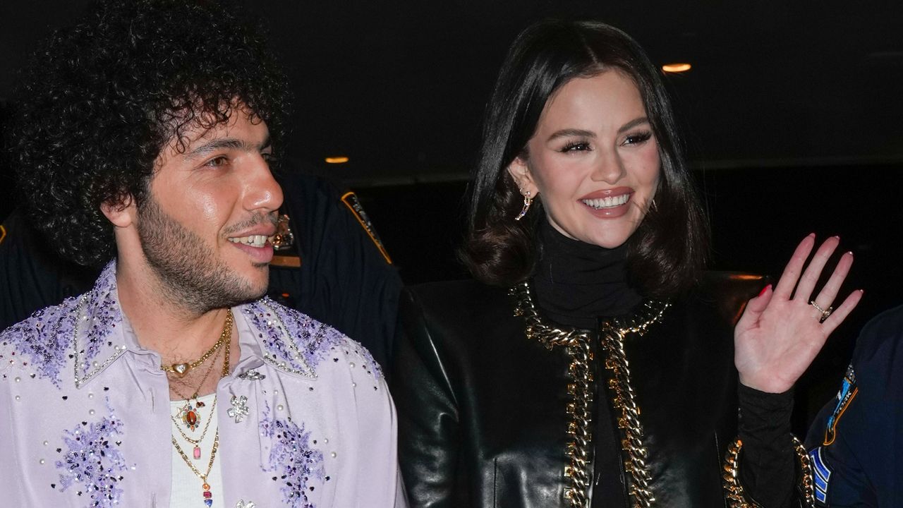 Benny Blanco and Selena Gomez leaving a late night show where Gomez wears a vintage matching set