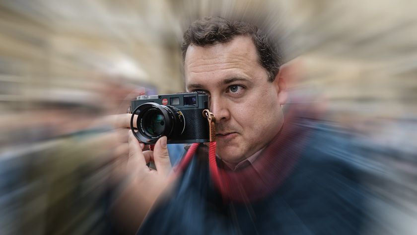 Sebastian Oakley in crowd with Leica camera with digital zoomburst effect over background