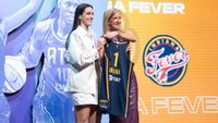 Caitlin Clark (l.) and WNBA commissioner Cathy Engelbert at the WNBA Draft in Brooklyn, New York. 