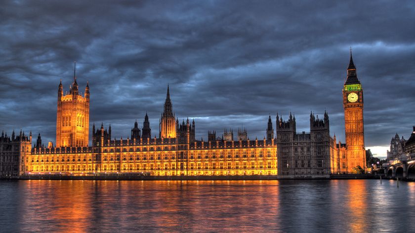 Photo of the Houses of Parliament at night from the South side of the river Thames. 