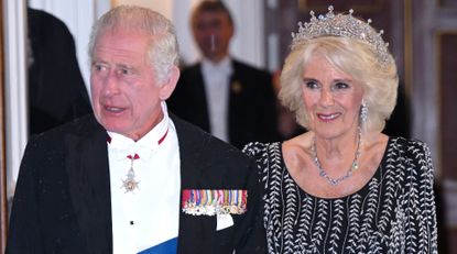 Queen Camilla and King Charles III arrive at a reception and dinner in honour of their Coronation on October 18, 2023 in London, England.