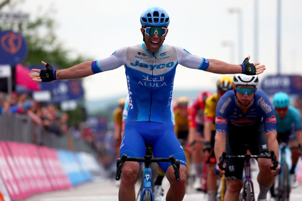 Team Jayco AlUlas Australian rider Michael Matthews celebrates as he crosses the finish line to win the third stage of the Giro dItalia 2023 cycling race 216 km between Vasto and Melfi on May 8 2023 Photo by Luca BETTINI AFP Photo by LUCA BETTINIAFP via Getty Images