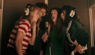 Queen singing together in recording studio in Bohemian Rhapsody