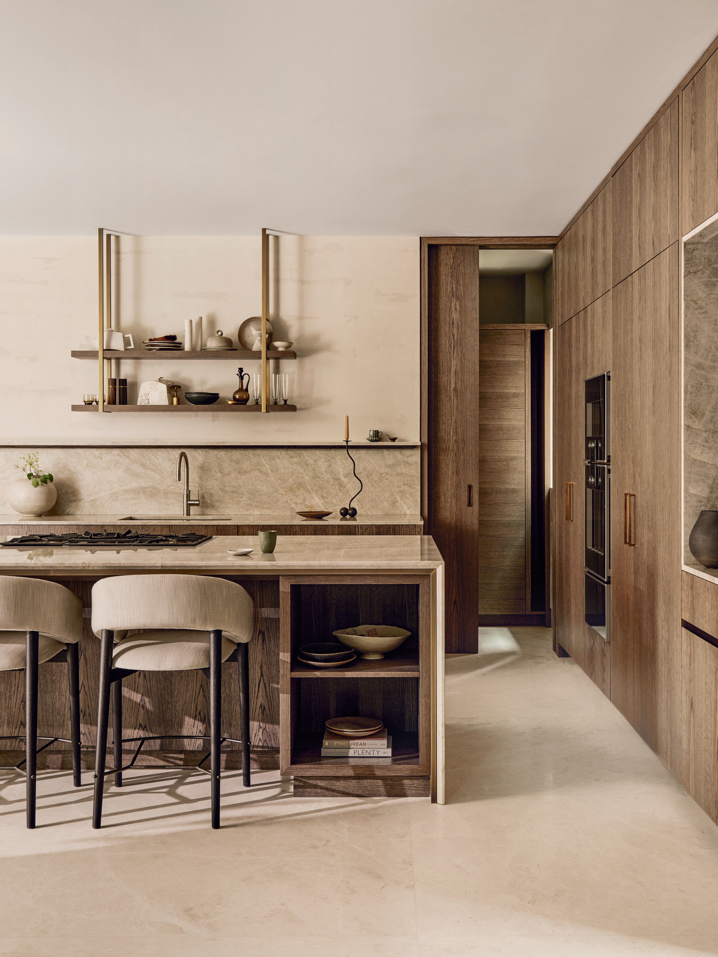 Beige kitchen with wood and stone surfaces