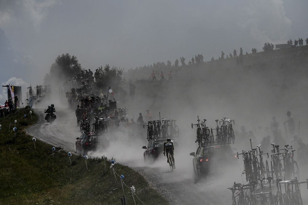 The peloton in the dust during stage 10 at the Tour de France