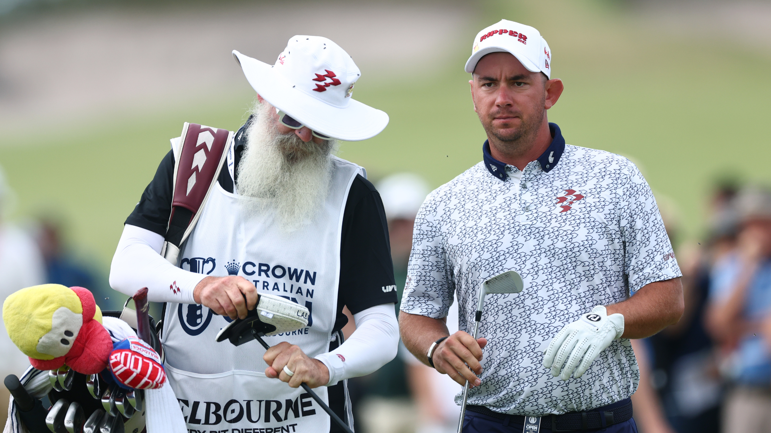 Lucas Herbert alongside his caddie at the Australian Open