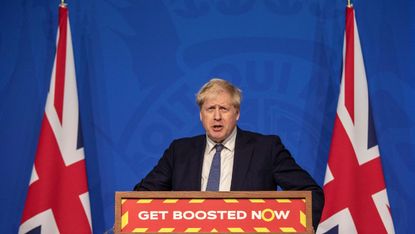 Boris Johnson behind a podium