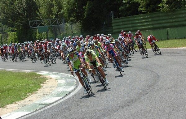 The riders enter the Imola race track.