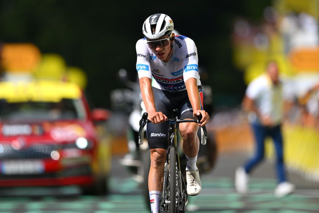 LELIORAN FRANCE JULY 10 Remco Evenepoel of Belgium and Team Soudal QuickStep White best young jersey crosses the finish line during the 111th Tour de France 2024 Stage 11 a 211km stage from EvauxlesBains to Le Lioran 1239m UCIWT on July 10 2024 in Le Lioran France Photo by Dario BelingheriGetty Images