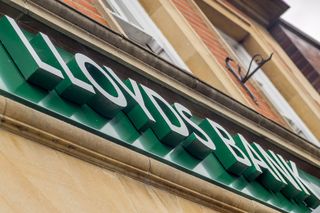 A shot of a Lloyds Bank sign on the side of a building