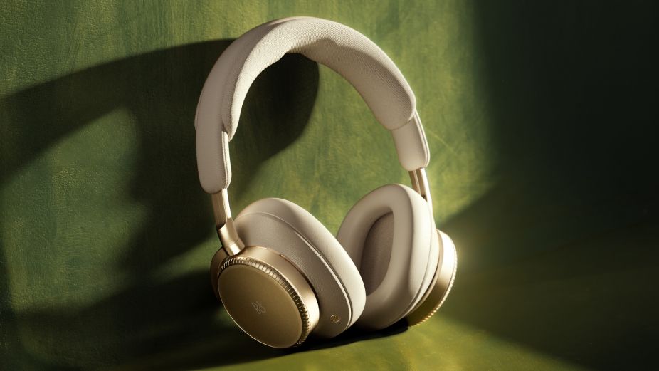 B&amp; H100 headphones on a green airplane seat