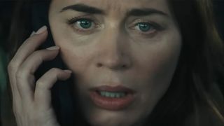 Emily Blunt's Margaret sparking a warning on a cell phone in Disclosure Day. 