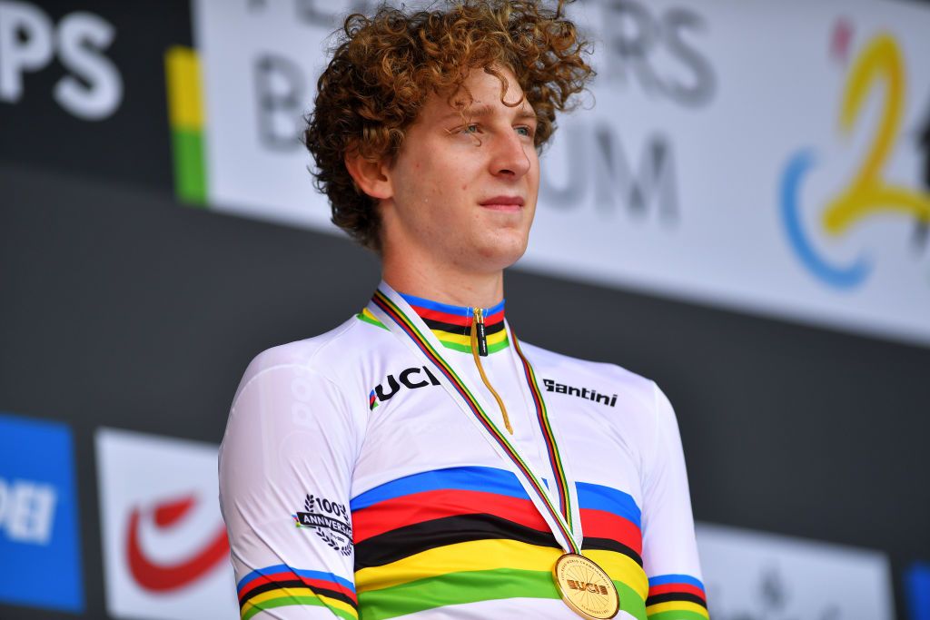 BRUGES BELGIUM SEPTEMBER 21 Gold medalist Gustav Wang of Denmark celebrates winning during the medal ceremony after the 94th UCI Road World Championships 2021 Men Junior ITT a 223km Individual Time Trial race from KnokkeHeist to Bruges flanders2021 ITT on September 21 2021 in Bruges Belgium Photo by Luc ClaessenGetty Images