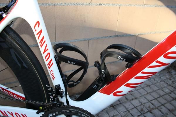 A pair of Tacx Tao aluminum cages sit waiting for bottles.