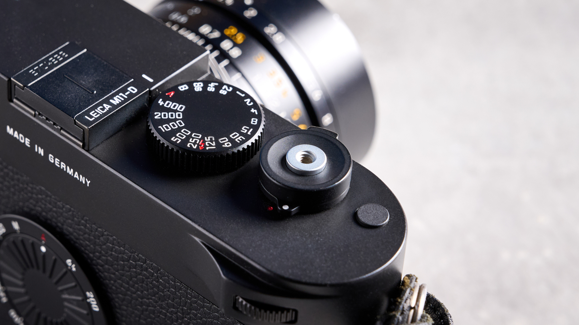 A black Leica M11-D rangefinder camera