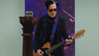 Troy Van Leeuwen with his new Squier Paranormal Telecaster XII in a still from the demo video.