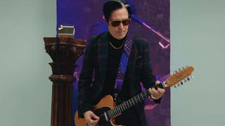 Troy Van Leeuwen with his new Squier Paranormal Telecaster XII in a still from the demo video.