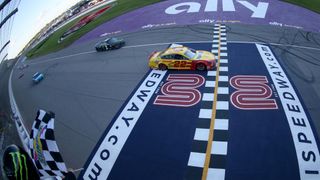 Joey Logano wins the 2019 NASCAR FireKeepers 400 Checkered Flag