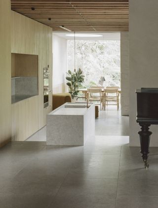 Kitchen view towards the rear at London house by Architecture For London