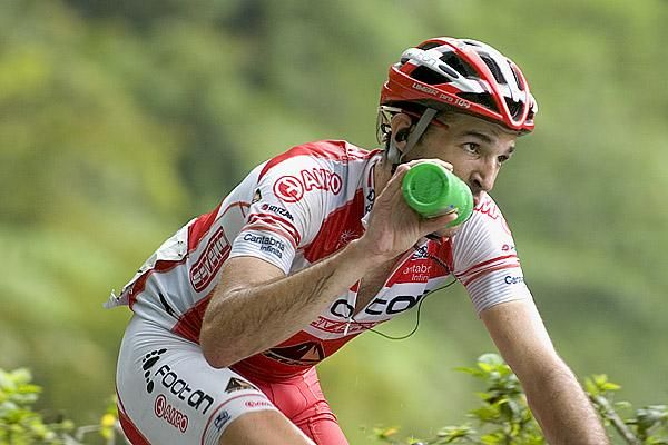Matthias Brandle (Footon-Servetto) from Austria takes a drink as he rides towards seventh place on the stage.