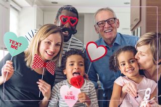 family with Valentine's Day themed photo props